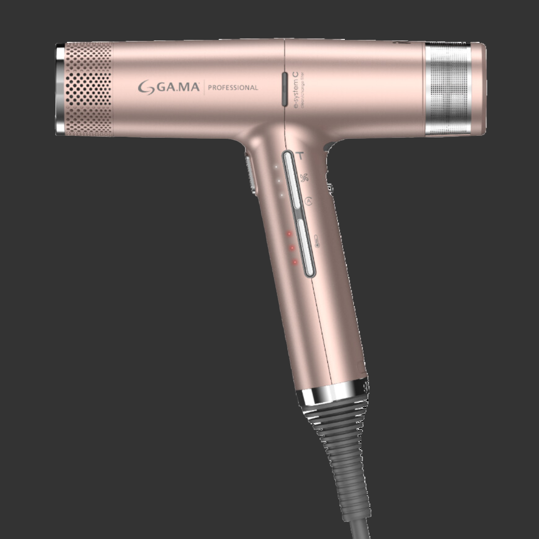 Rose gold hair dryer with Gama Professional branding on a white background